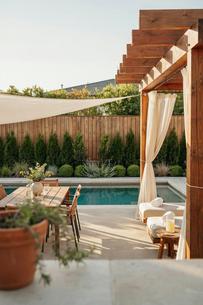 Use a Combination of Privacy, Shade, and Poolside Design Features
